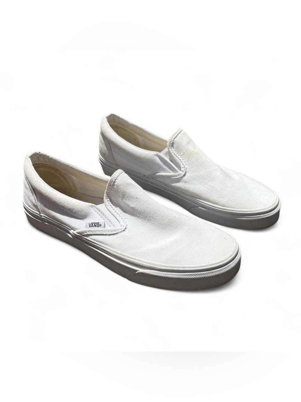White Vans Classic Slip On shoes